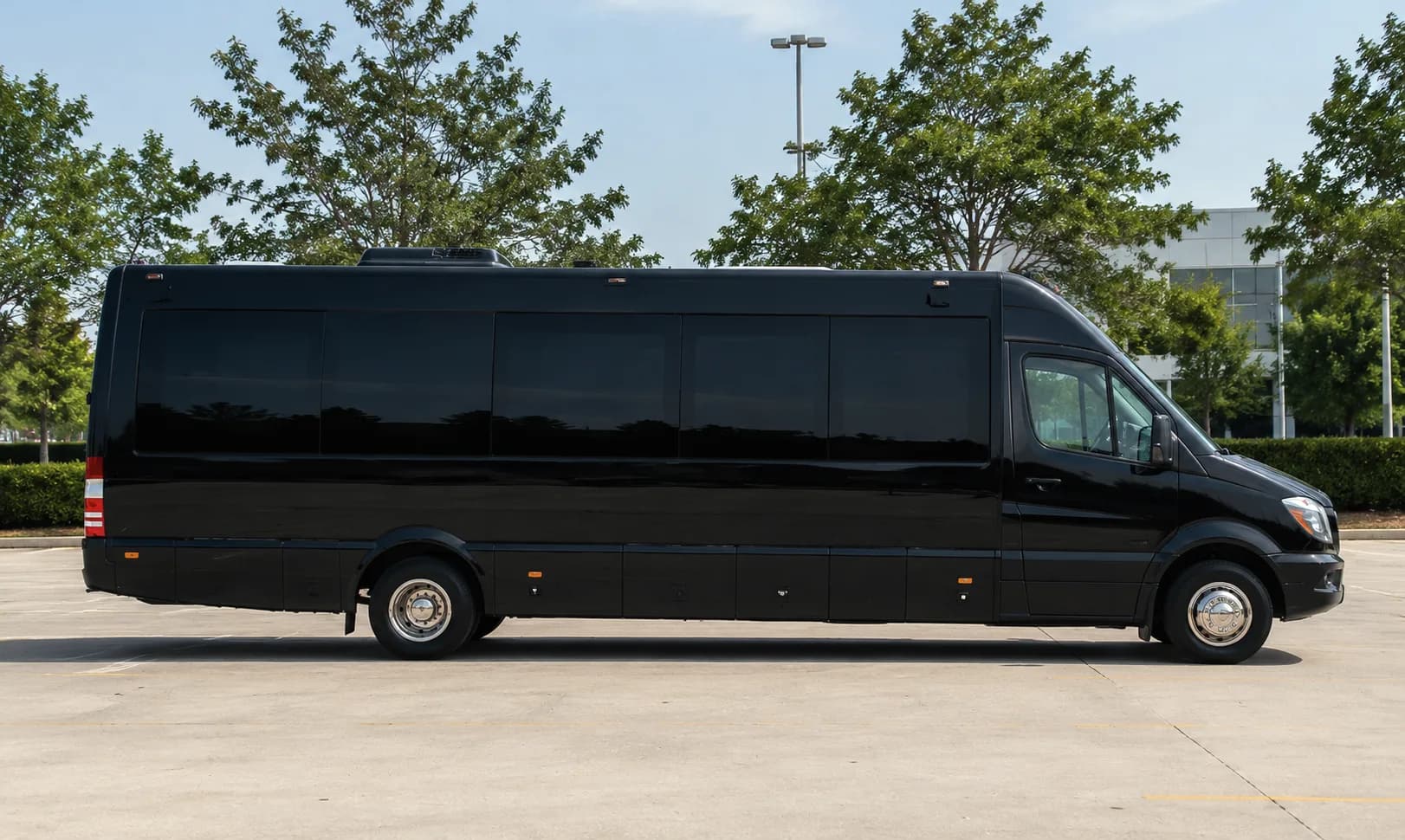 Mini bus parked outside a venue