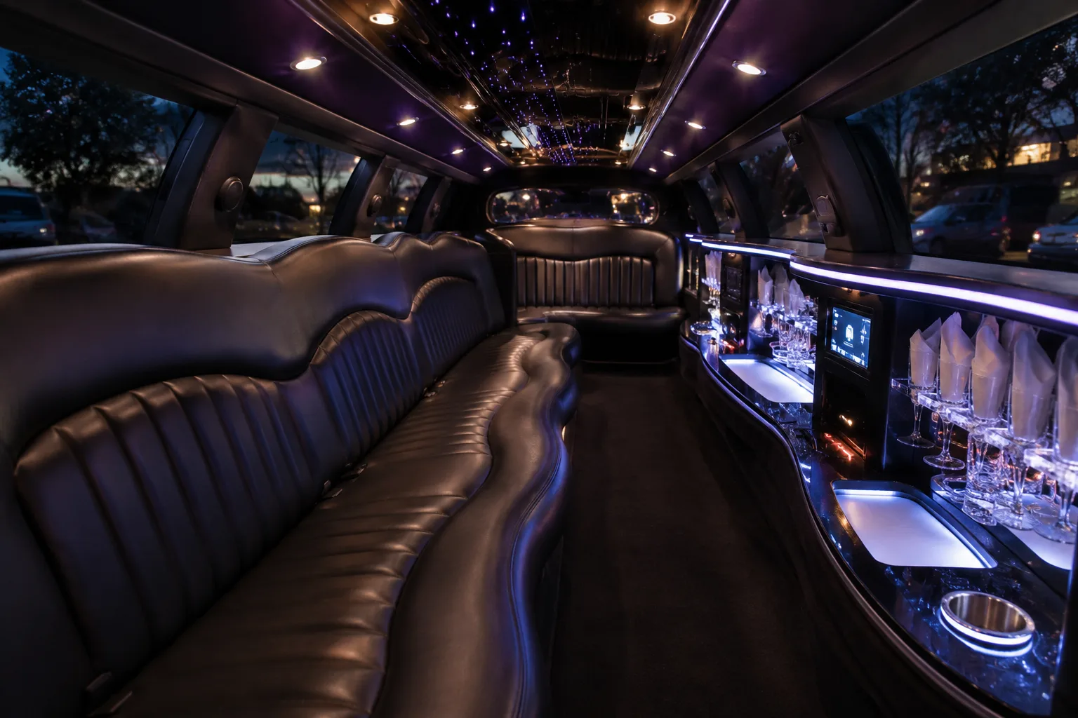 Stretch limousine interior with leather seating and bar