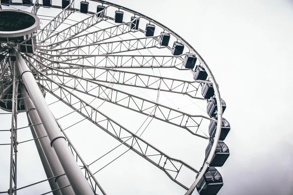 The Centennial Wheel rising above Navy Pier against a bright overcast sky